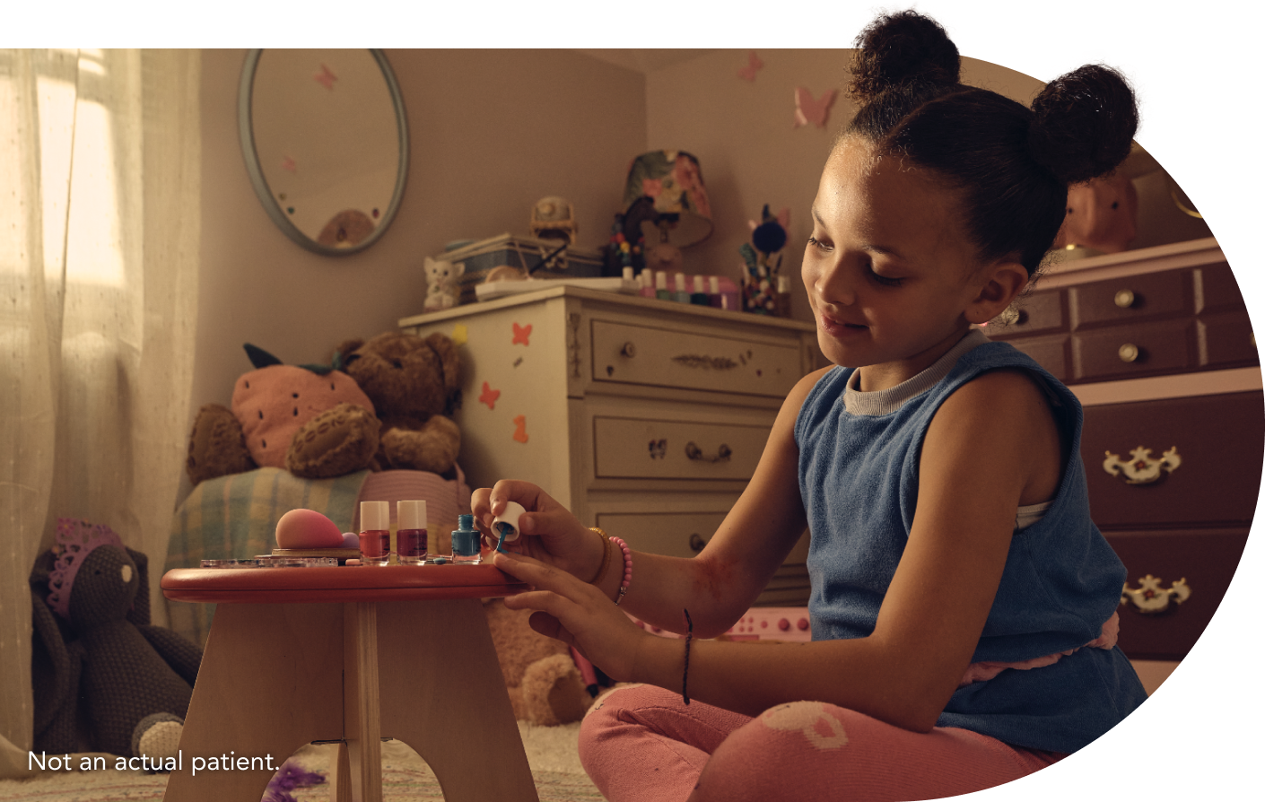 Child painting nails, not an actual patient